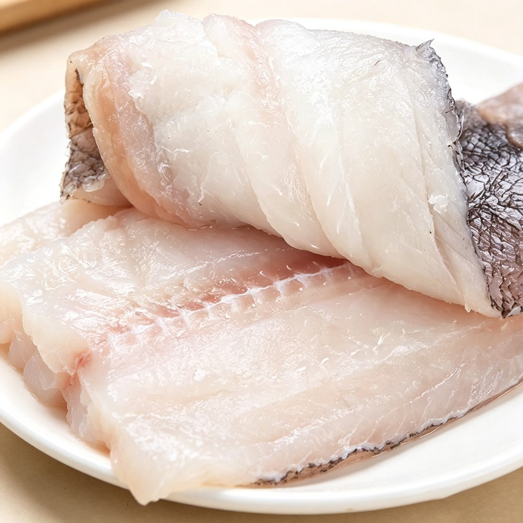 Skinned sole fillets folded on a plate